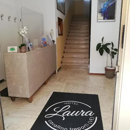 Laura *